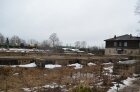 Область вложилась в строительство многоэтажного дома, район - нет. В итоге фундамент уже разрушается